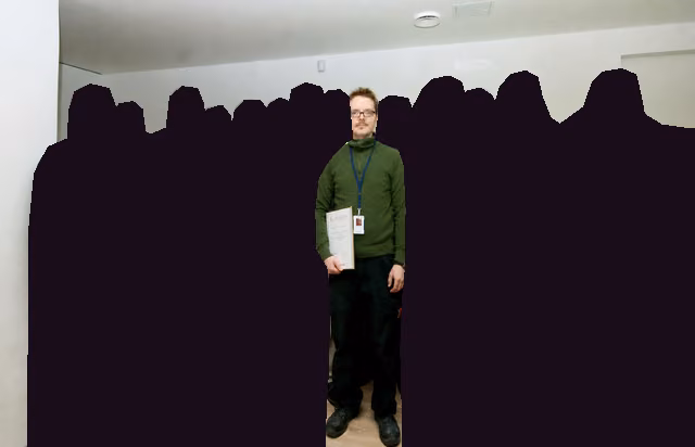 Holding a certificate of merit in a row of colleagues printed as silhouettes